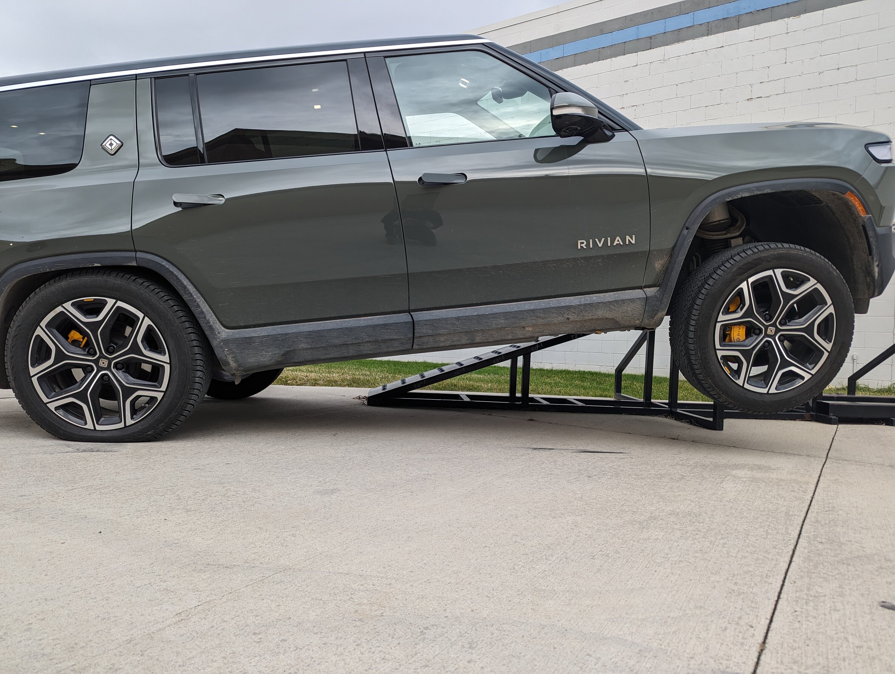 Rivian R1T R1S "Park brake performance reduced on steep grades" -- new since 2023.50.01? 1000002397