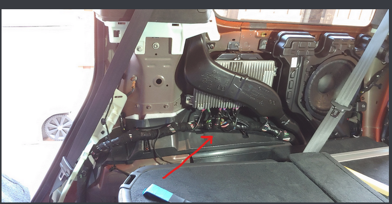 Rivian R1T R1S Teardown: R1S Audio Unit under drivers seat and speaker harness pinnout. 1694784145996