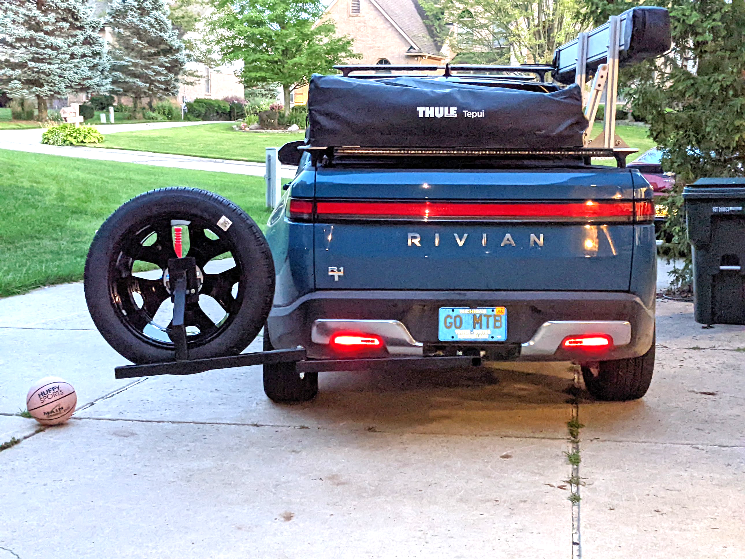 DIY Hitch mounted spare tire swing-out carrier for Rivian R1T a.png