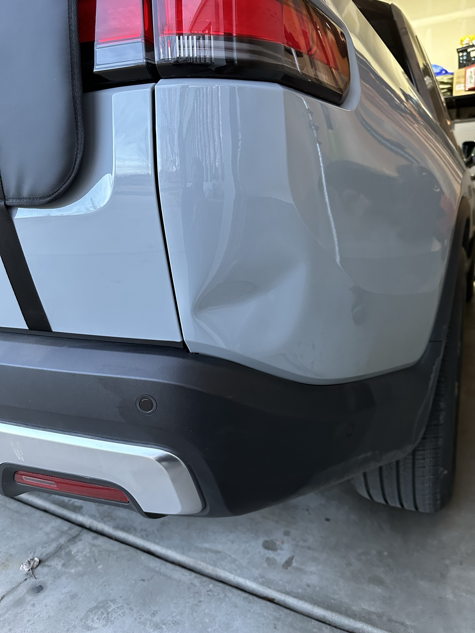 Rivian R1T R1S A Master at Work - Paintless Dent Repair (PDR) MAGIC on my R1T here in Colorado! IMG_1717.JPEG