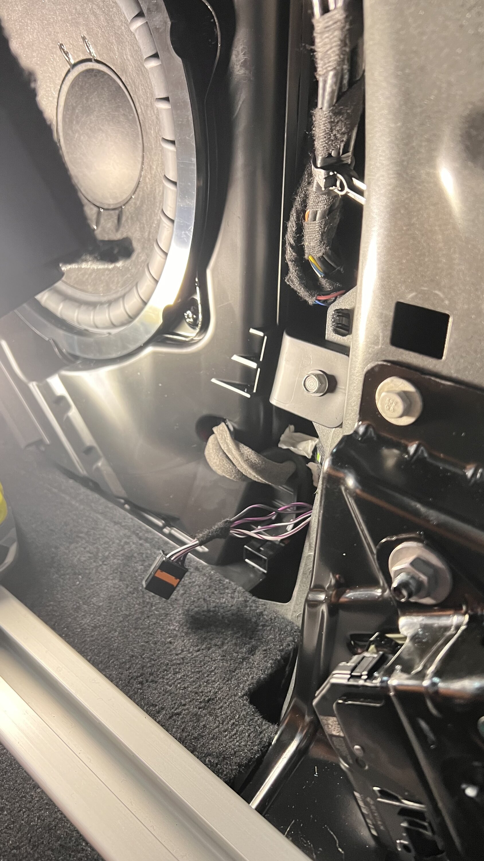 Rivian R1T R1S Teardown: R1S Audio Unit under drivers seat and speaker harness pinnout. IMG_3543