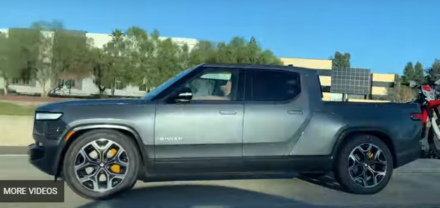 Rivian R1T R1S Two More R1T Prototypes Spotted, Including Matte Black Wrapped R1T highway slam shot.PNG