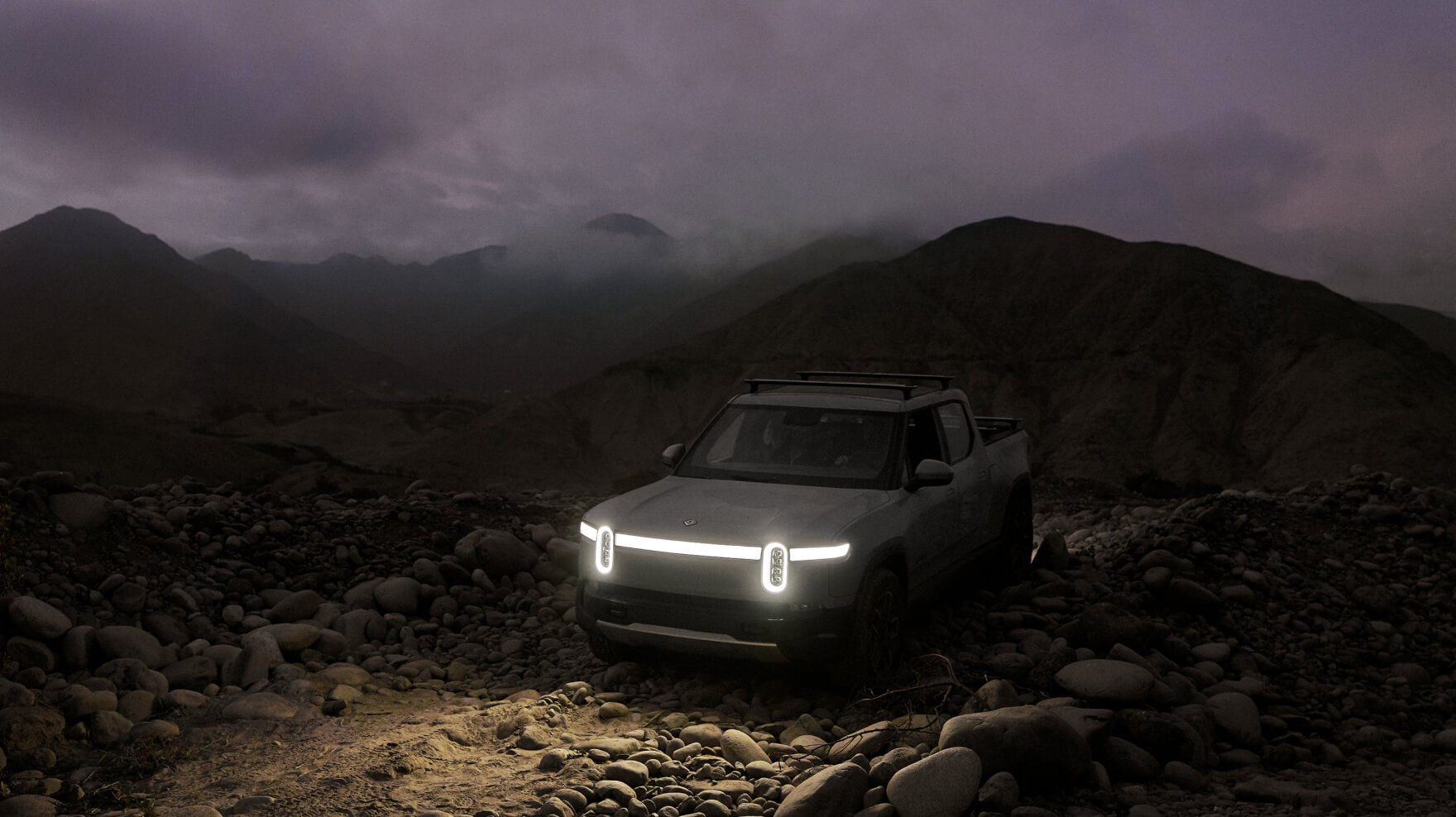 Rivian R1T R1S All new images from Rivian Website update 11/11/2020 r1t_capability_real_world_adventures_video_cover_deskto