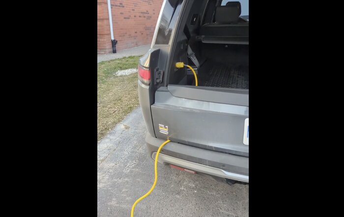 R1S TIP: Easy and safe method for 120v AC extension cord pass-thru outside vehicle