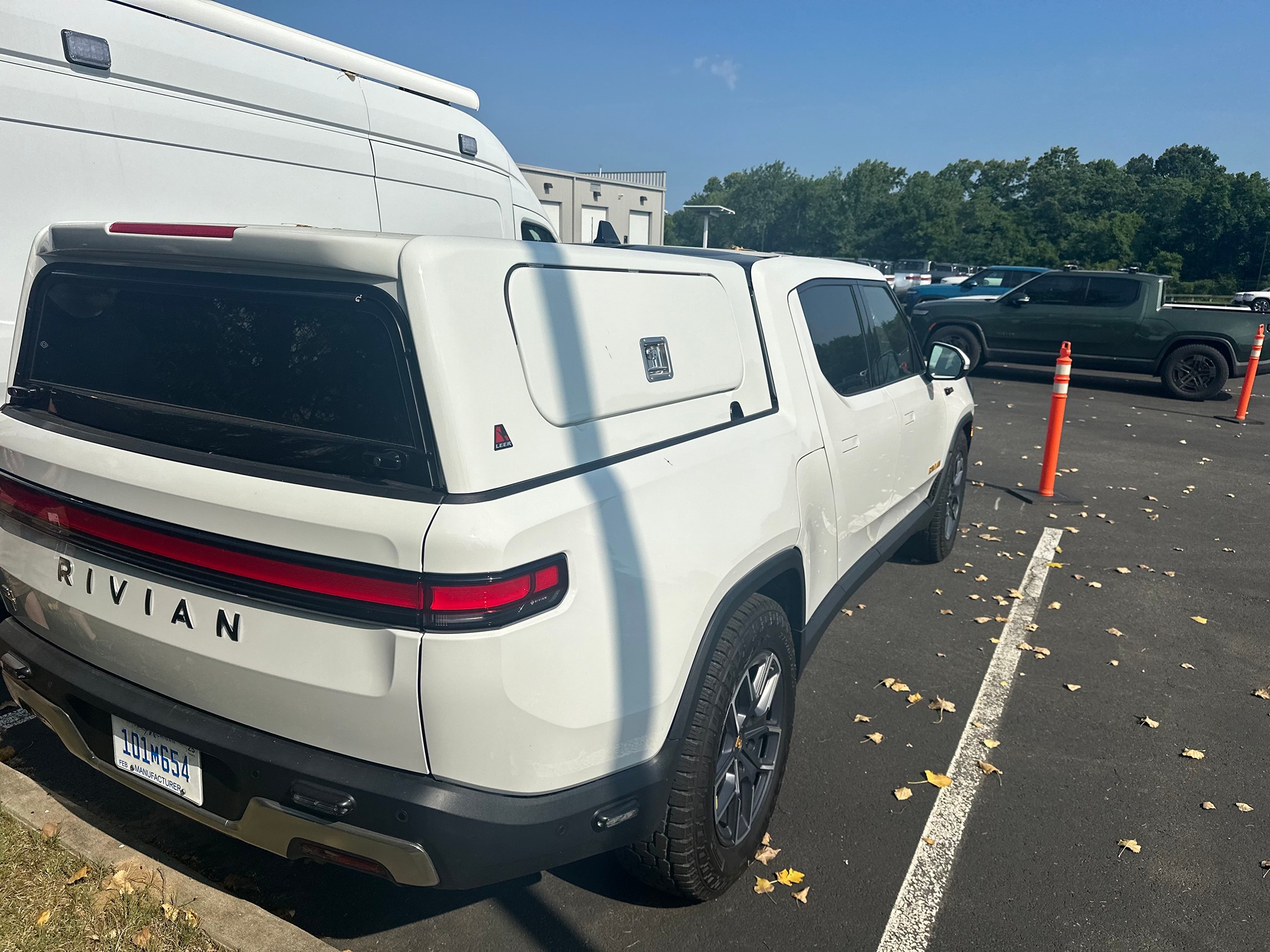 Leer Bed Cap Topper and Brush Guard spotted on Rivian R1T manufacturer ...